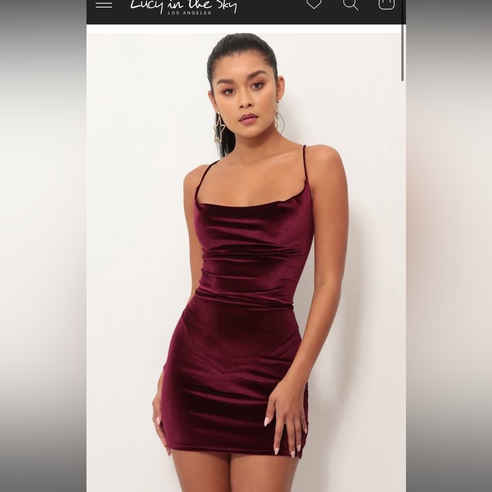Lucy in the sky burgundy dress with a velvet material and strappy back!